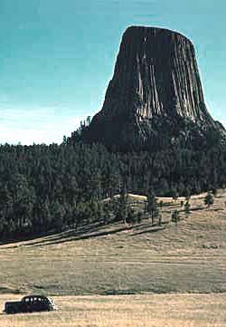 (NPS Photo) The namesake rock of Devils Tower National Monument juts from the surrounding landscape.