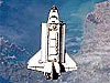 Space shuttle Endeavor in flight over Earth