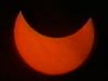 Partial solar eclipse from Florida, setting over the Gulf of Mexico. December 14, 2001
