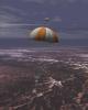 Sample Return Capsule Parachuting Down To Earth (Artist's Concept)