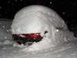 Image of car buried in deep snow near Clark, Colorado