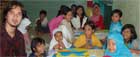 Ahmad Dhani sings with group of street children at charity Buka Puasa ,Iftaar, dinner with Under Secretary Hughes, Jakarta, Oct. 21, 2005. U.S. Embassy photo.