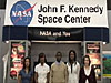 Students standing in front of a 'NASA and You' display