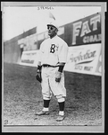 Casey Stengel, full-length portrait, standing, facing left, wearing sunglasses, while playing outfield for the Brooklyn Dodgers]