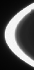 Prometheus zooms across the Cassini spacecraft's field of view, attended by faint streamers and deep gores in the F ring. This movie sequence of five images shows the F ring shepherd moon shaping the ring's inner edge