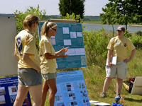 Oceanographers teach others about restoring marshes using tidal information.
