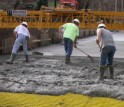 Workers covered the composites with concrete in the final steps of the bridge renovation