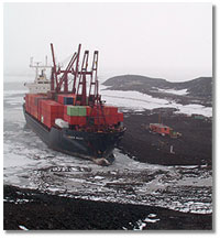 the supply ship Green Wave offloads cargo