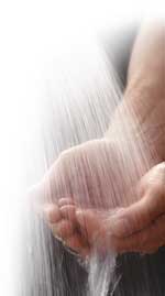 image of hands catching water