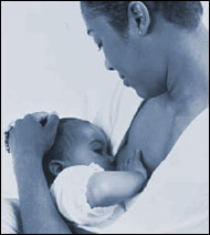 Photo of a breastfeeding mother and child