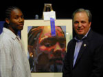 Congressman Doyle with 1st place student artist Tyron Morrison.