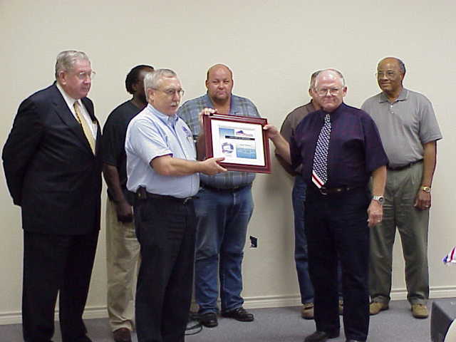 NWS MIC presents StormReady certificate - click for larger image