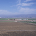 Hazy blue sky over field