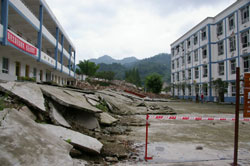 Fault rupture at Bailu Middle School did little damage to new bldg (left), Wenchuan 2008 [photo: M Lew]