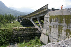 Xiaoyudong Bridge damaged by fault rupture thrusting abutment, Wenchuan 2008 [photo: M Lew]