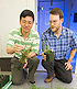 Geneticist Yong Gu (left) and molecular biologist John Vogel examine transgenic Brachypodium plants. Link to story.
