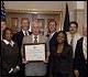 Closing the Circle Award Recipients - Front Row Left to Right: Shana Y. Love, Secretary Edward Schafer, Ciara Bond, Mark Sajbel Back Row Left to Right: Glenn Haggstrom, Todd Repass, John Crew, Edward Murtagh