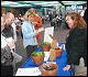 Dr. Pat Millner of the Agricultural Research Service in Beltsville demonstrated how the compostable food service products from the cafeteria are being returned as "earth friendly" soil amendments.  Dr. Millner displayed compost made from USDA cafeteria waste that is being used to grow vegetables