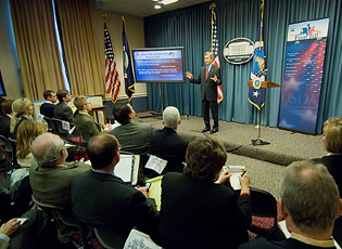 Agriculture Secretary Mike Johanns announced the provisions of the 2007 Farm Bill in Washington at a news conference. The proposals unveiled represent the final phase of a nearly two year process. Each detailed proposal provides information about why a change is needed, the recommended solution, and relevant background information about the impacted program or policy. Keith Collins (left) Chief Economist and Chuck Conner (right) Deputy Secretary listen in the front row.  Jan. 31, 2007 USDA Photo 07di1229-02