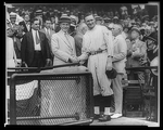Calvin Coolidge shaking hands with Walter Johnson
