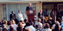 President Clinton speaks to audience in front of Daisy Bates Home NHL.