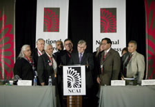 Joe Garcia, President of National Congress of American Indians (third from left), and its Executive Board witness Census Bureau Director Steve Murdock as he signs the Census Bureau's first American Indian and Alaska Native Policy. Click here for larger image.