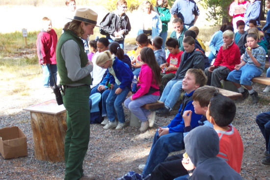 A Ranger talks to a school group about the Postpile.