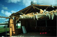 End of classroom building, remaining roof truss and wall system