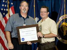 Stephen Turner receives the Director’s Commendation from Marshall Center Director David King