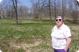 Kathy Flanigan at the site of her former home