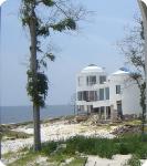Hurricane Katrina damaged the contemporary house nextdoor to Charlotte Lamar's house.