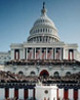 Photo of people standing on Capitol building in Washington, DC.