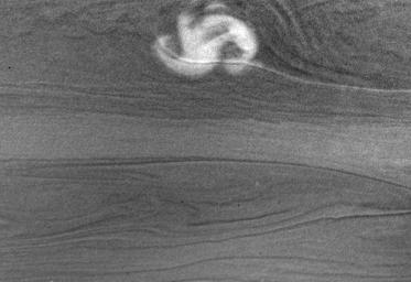 This image shows a rare and powerful storm on the night side of Saturn (Reprojected View)