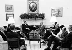 Meeting with Global AIDS Coordinator Randall Tobias, Secretary Powell and others in the White House Oval office [White House photo office]