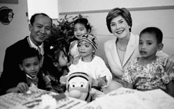 Laura Bush visits the Queen Sirikit, National Institute of Child Health. Bangkok, Thailand [White House phto office]