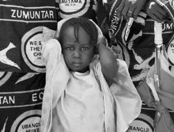 African child with umbrella [White House photo office]
