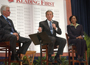 President George W. Bush speaking with G. Reid Lyon and Cynthia Henderson.