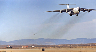 QF-106 towed by C-141A