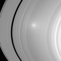 Two images of Saturn's A and B ring showcase the opposition effect, a brightness surge that is visible on Saturn's rings when the Sun is directly behind the spacecraft