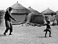 Photo of blind man led by a young boy