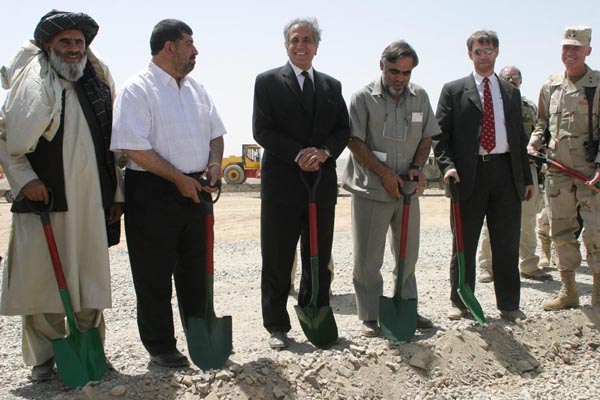 U.S. Ambassador Zalmay Khalilzad broke ground with the Governor of Oruzgan, Minister of Public Works, Governor of Kandahar, USAID Afghanistan Director, Patrick Fine, and U.S. Major General Olson for the Kandahar to Tirin Kot Road on Thursday, September 9th. By cutting the drive time from 12 hours to 3 hours, the 130km road will restore a valuable trade route between two key southern cities in Afghanistan - improving security, commerce and access to health care and education for tens of thousands of Afghans. The road is funded by the U.S. Agency for International Development and will be built by the U.S. Army's 528th Engineer Battalion. It is expected to be completed by the end of 2005 and will cost approximately $20 million. State Department Photo.