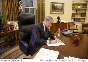 President George W. Bush fills out his ballot for the 2008 election during the early voting process from his Oval Office desk at the White House Friday, Oct. 24, 2008. Ballots cast by both the President and Mrs. Laura Bush will be mailed back to Texas today. White House photo by Eric Draper