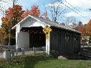 The covered bridge was returned to it's original site following restoration and structural retrofitting. The site was also strengthened.