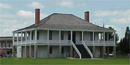 The hosptial/visitor center is the best example of French Colonial architecture on site. Note all of the elements.