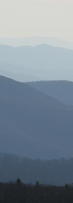 Blue ridges disappear to the horizon in Shenandoah National Park.