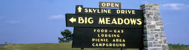 A large wooden and rock sign welcomes you to Big Meadows.