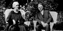 Herbert and Lou Henry Hoover sitting on the porch of the Brown House at Rapidan Camp in Shenandoah National Park.