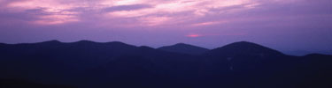 A purple sky meets black mountain as a new day begins in Shenandoah.