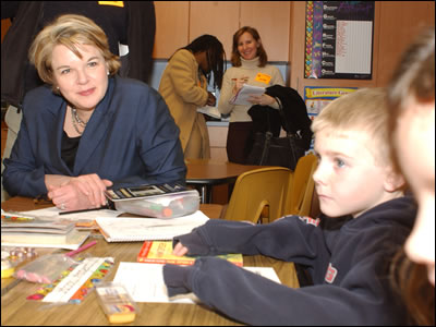 Secretary Spellings watches as students at Guilford Elementary School in Columbia, Maryland, work on a computer-based activity.  Later, Spellings announced proposed regulations to enhance the ability of schools and states to more effectively measure the achievement of students with disabilities.