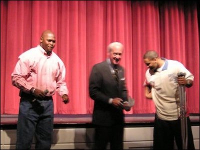 Deputy Secretary Hickok introduces Arizona Cardinals Bertand Berry and Marcell Shipp during an NFL 